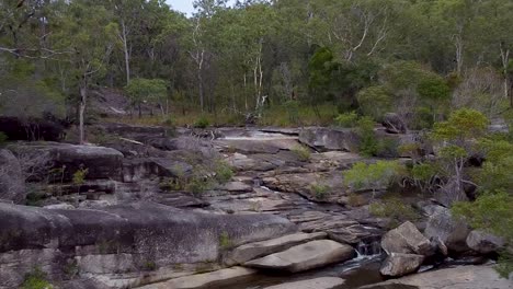 the stunning davies creek falls, the perfect relaxing nature getaway - aerial reverse