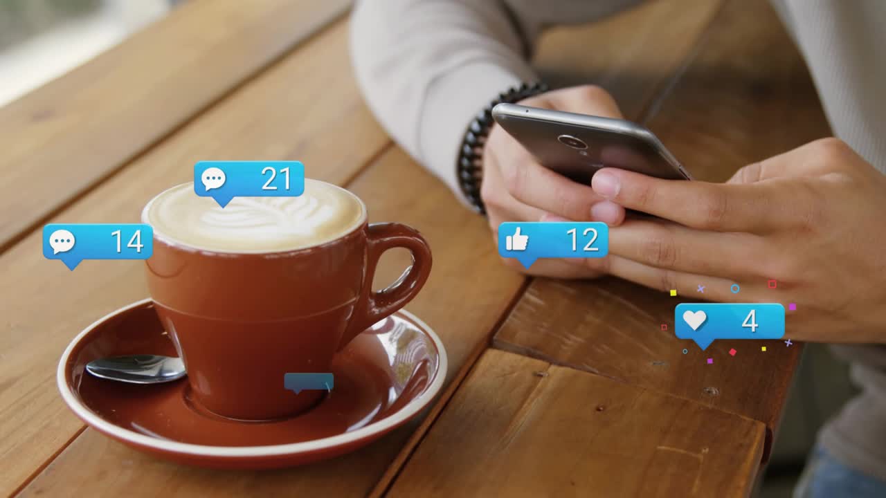 Male tapping phone on cafe table generating animated like heart follower icons with rising counts