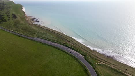 High-aerial-view-of-a-rider-on-top-of-the-cliffs-on-Africa-Twin