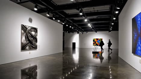 modern art gallery with visitors