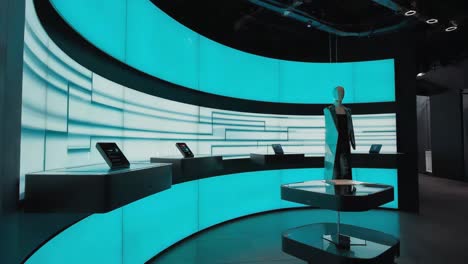 modern showroom with tablet displays and mannequin