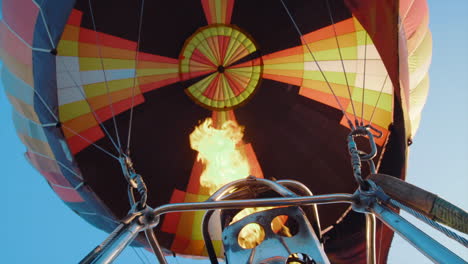 gas burner blowing up hot air balloon