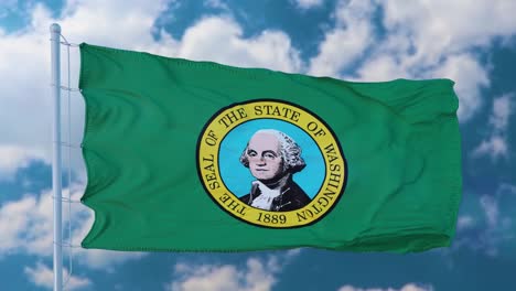 Washington state flag on a flagpole waving in the wind, blue sky background