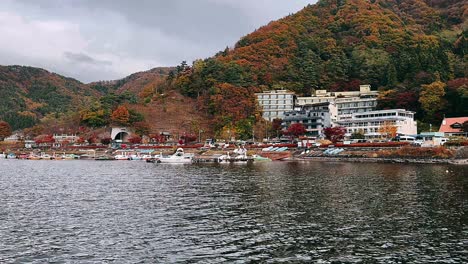 autumn lakeside town with colorful foliage