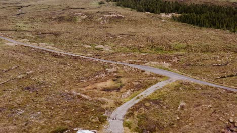 Drone-shot-over-a-moorland-shieling-by-a-track-road-on-the-Isle-of-Lewis