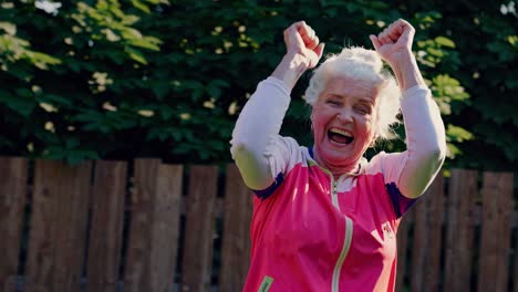 happy senior woman exercising outdoors