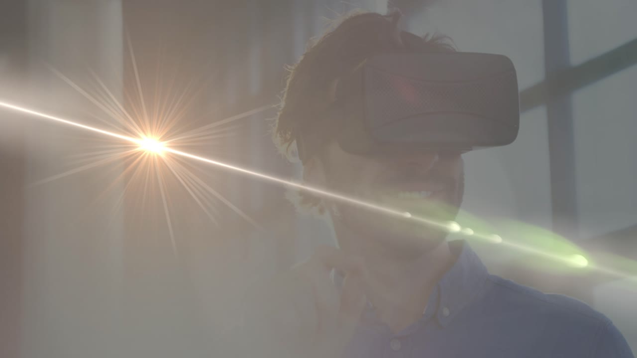 Animazione di punti luminosi su un uomo caucasico con visore VR