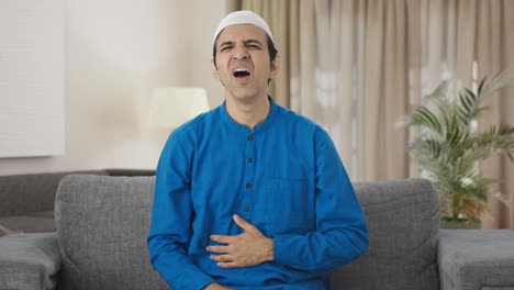 sick muslim man having heart attack