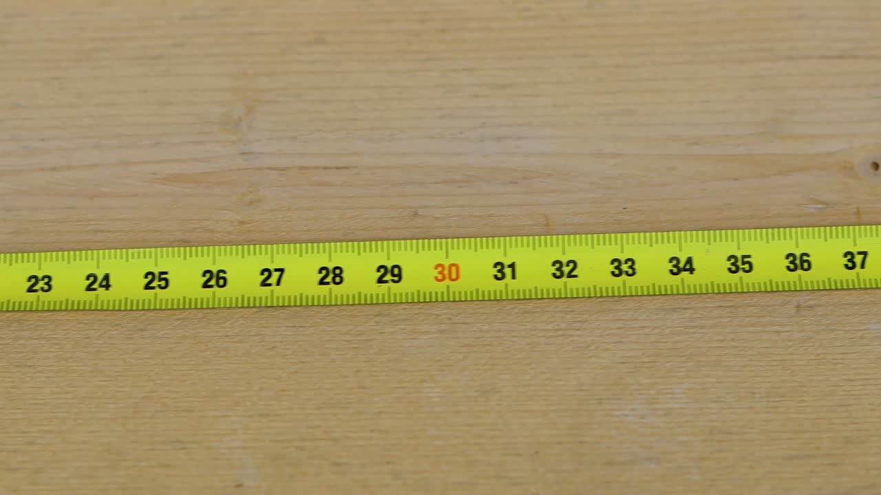 tiro de una cinta métrica de izquierda a derecha, de 0 a 70