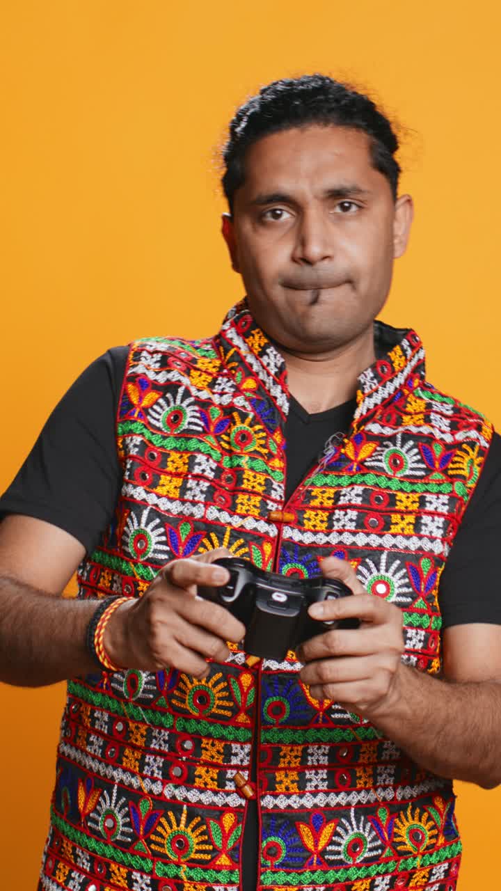 Frustrated Gamer Man Playing Video Game with Controller
