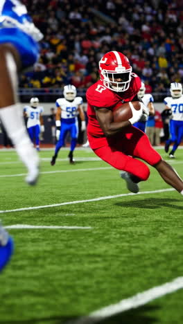dynamic american football game: player carrying ball and being tackled