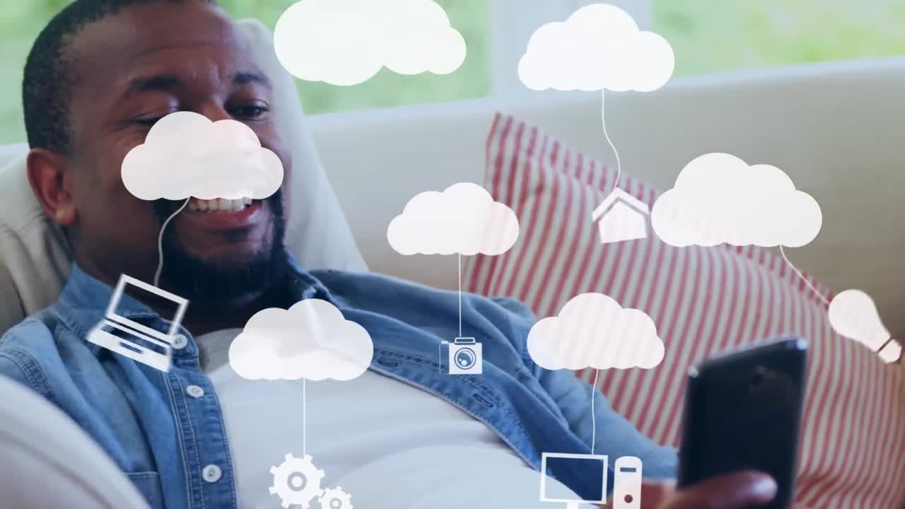 Animation of clouds and media icons over man using smartphone
