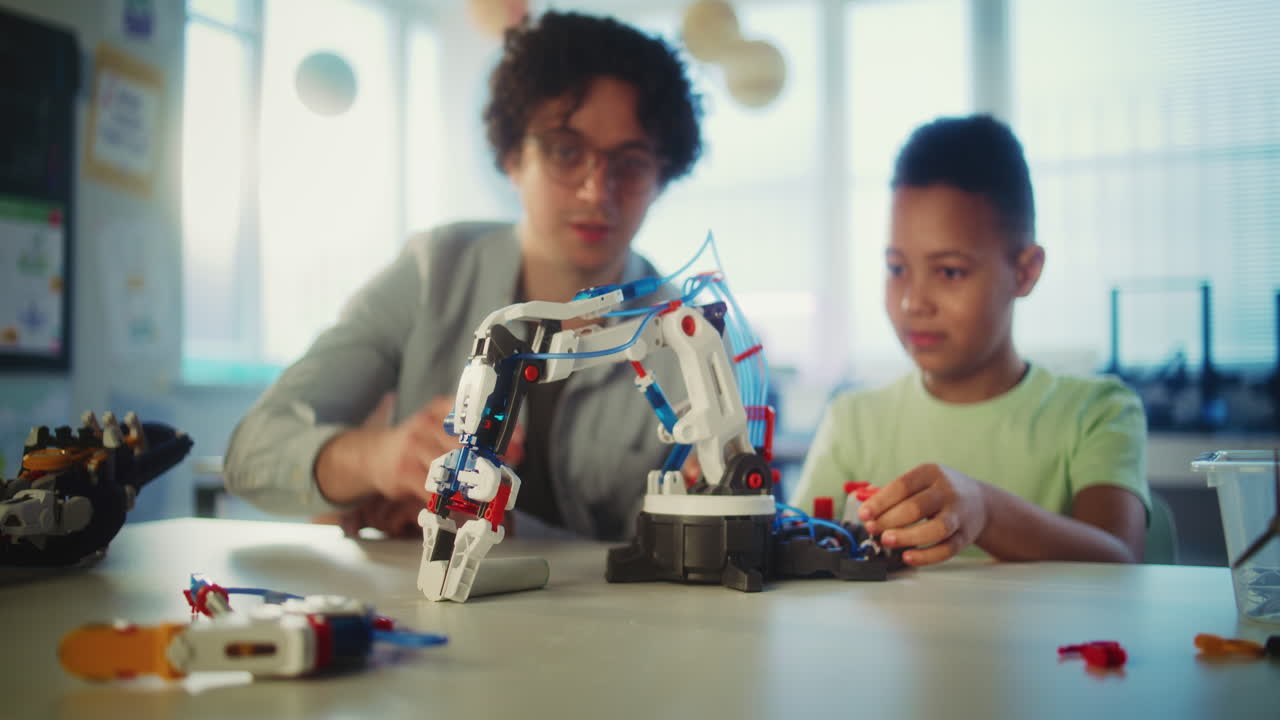 Children learning about robotics with a teacher