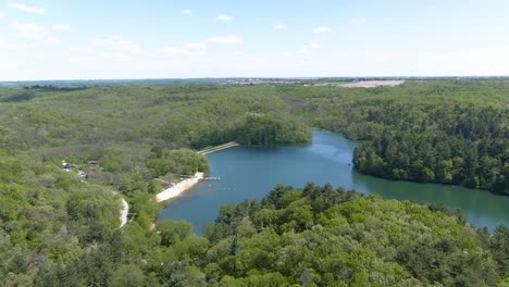 high altitude aerial of a lake in the mountains in wisconsin, usa