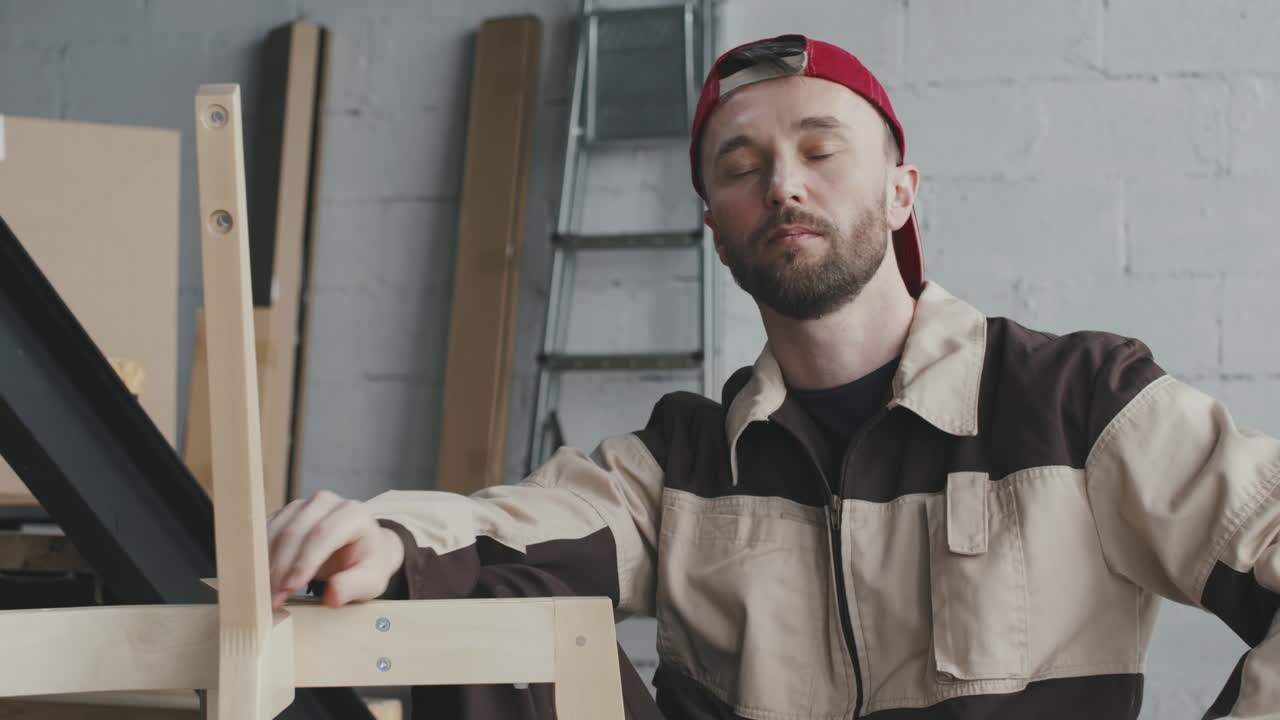 Man in woodworking shop
