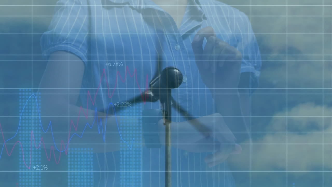 turbina eólica y gráfico financiero animación sobre persona en camisa a rayas