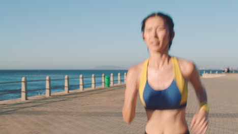 fitness, beach and woman running on path in tokyo