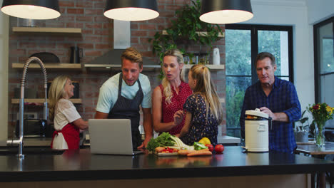 happy family cooking together at home