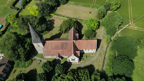 a slow top-down pan of st john the evangelist church in ickham, kent