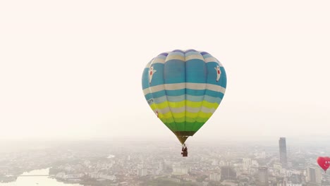 - hot air balloons fly in the imperial city of hue, vietnam