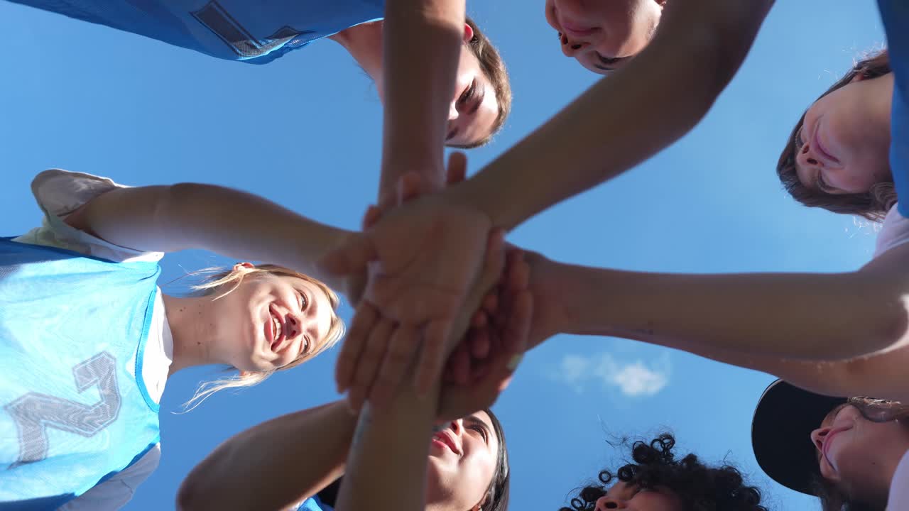 Team Huddle Under Blue Sky