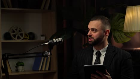 podcast interview with man in business suit