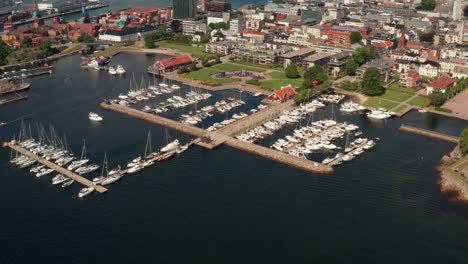 boats in the harbour of kristiansand in norway