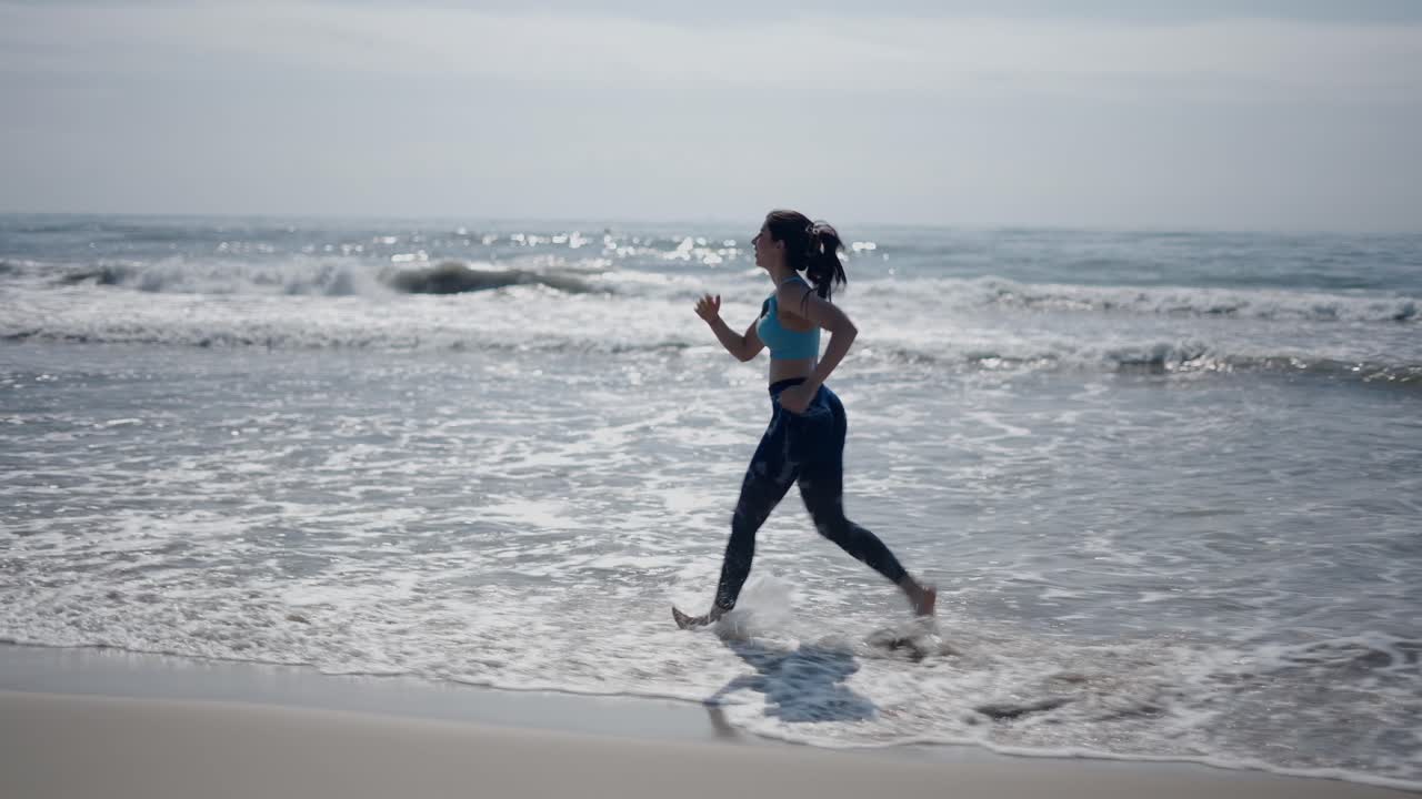 Woman Running on the Beach