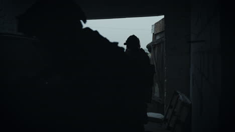 soldiers in a dark underground garage