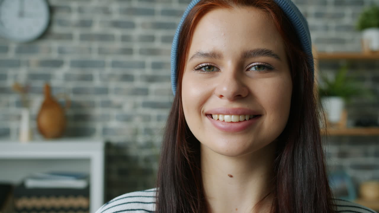 Smiling Woman in a Beanie