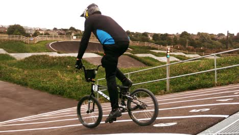 bmx biker riding on ramp