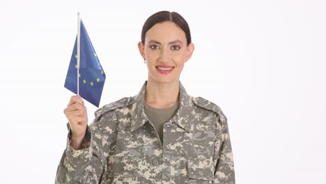 young woman in military uniform holding european union flag