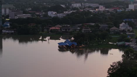 riverfront cityscape at sunset