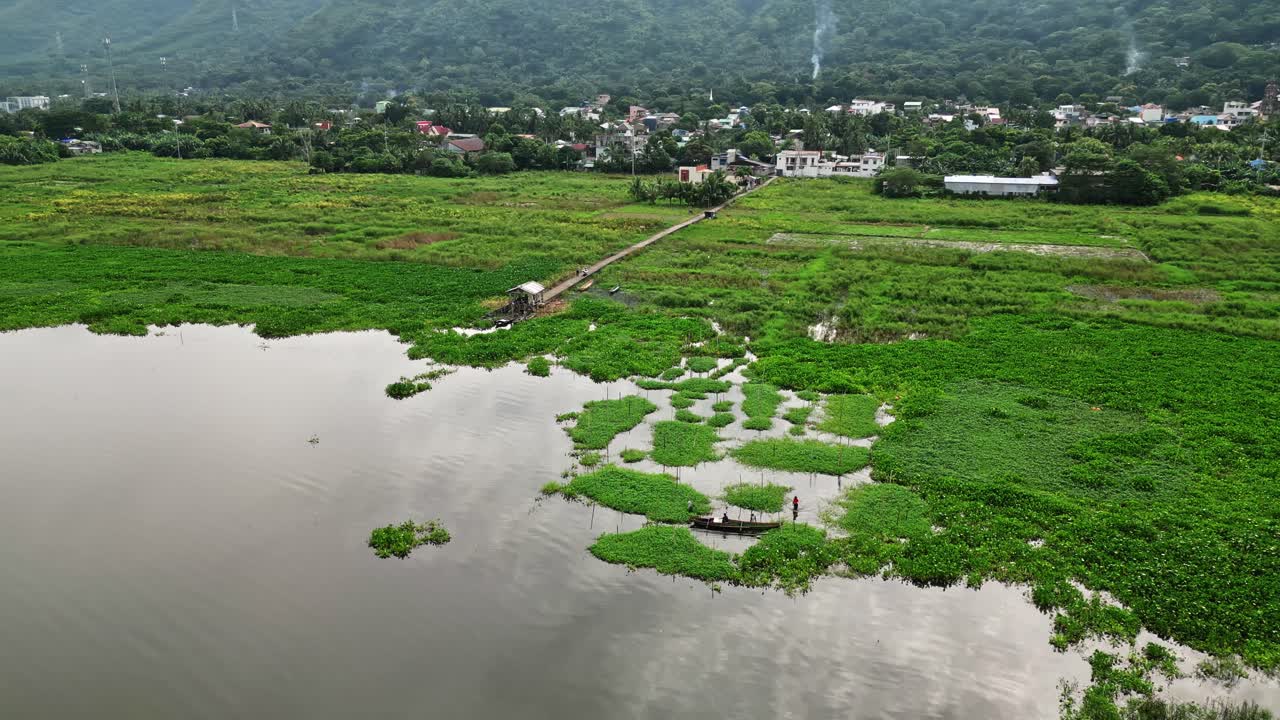 The aerial perspective highlights the vulnerability of the wetlands to environmental changes, emphasizing the need for conservation efforts near Mauban, Quezon