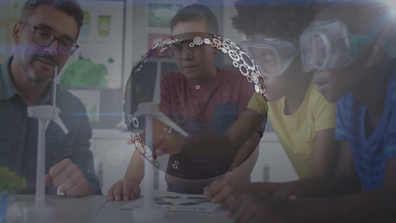 Mentor and 3 boys turning turbine, teaching energy while gear globe drifting over hands, models