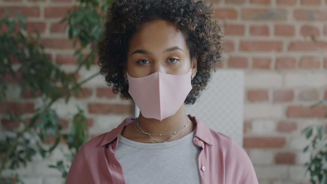 Woman Wearing Pink Face Mask