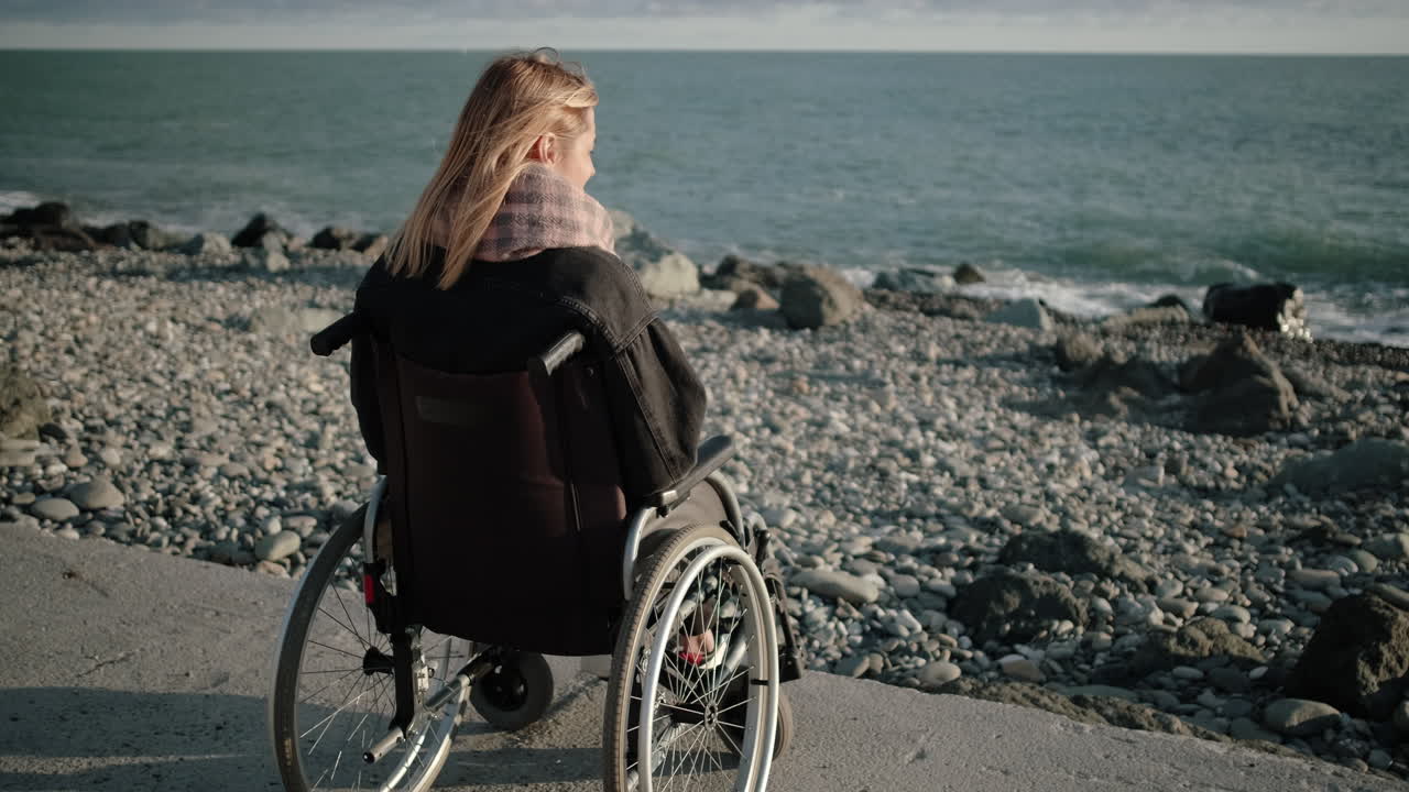 Woman in Wheelchair at the Beach