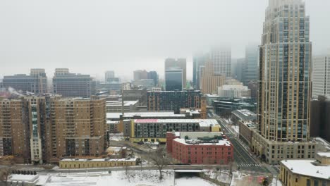 tracking shot of foggy minneapolis skyline on frigid winter day