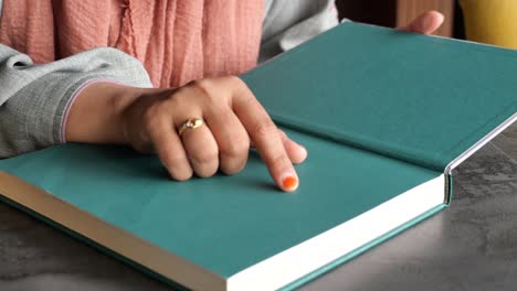 woman reading an open book