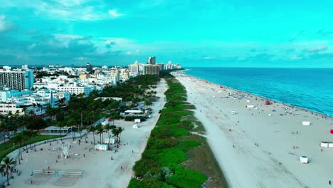 miami south beach drone view flying over the sand and trees