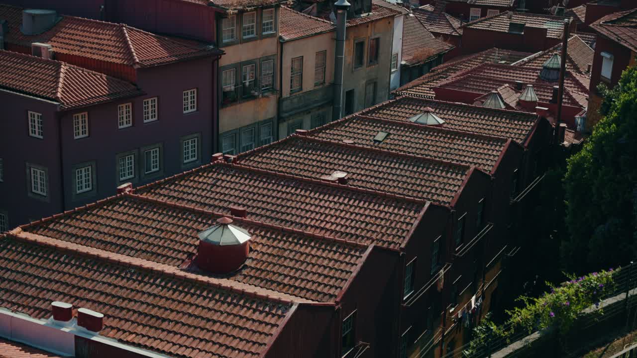 Traditional red tiled rooftops of Ribeira district in Porto Portugal