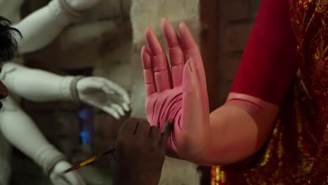 in kumortuli, idol artists are making idols of durga, the revered deity of hinduism. the work of making these idols starts from june and these potters make many idols till november.
