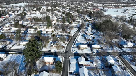 aerial view of an american suburb with snow