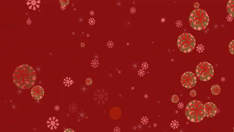 Multiple-snowflakes-and-christmas-gift-icons-falling-against-red-background