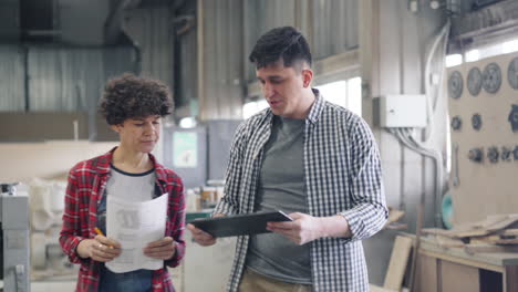 teamwork in a woodworking workshop