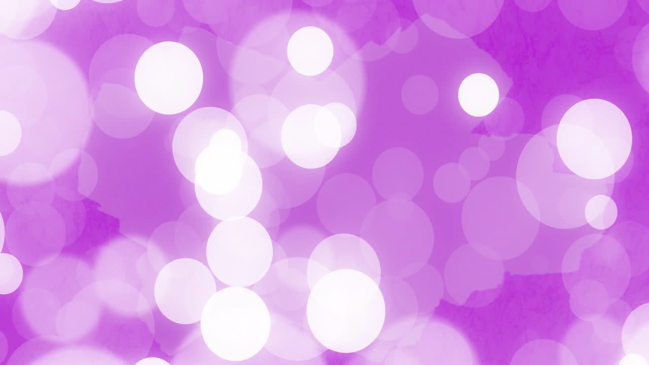 Animation of white spots on purple background