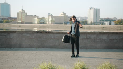 businessman dancing on city streets