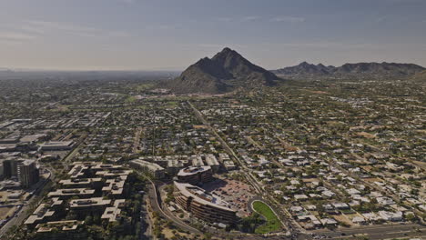 scottsdale arizona aerial v7 panoramic views drone flyover and around downtown capturing old town cityscape, camelback mountain, canal and desert neighborhoods - shot with mavic 3 cine - february 2022