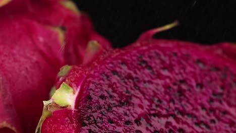 detailed view of a single dragon fruit slice showcasing its vivid color and texture.