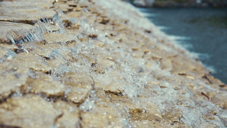 water streaming on stones